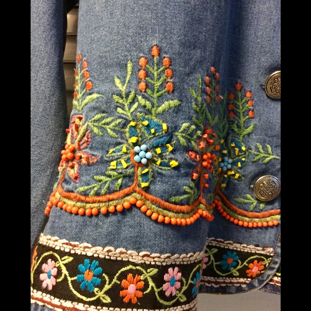 Brightly beaded and embroidered denim jean jacket.